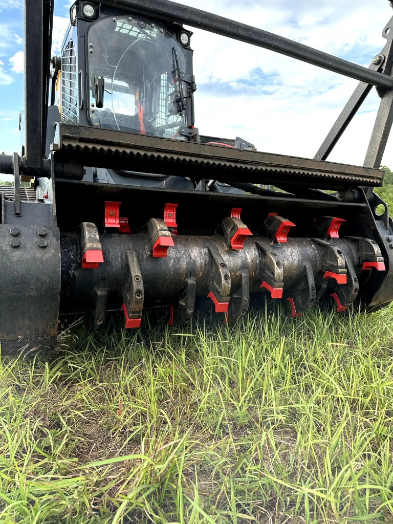forestry mulching cost in Alabama — Deep South Mulching skid steer land clearing machine Mobile AL